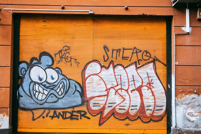 Alternative Street Art Free Walking Tour of Budapest - Finding your guide: Rákóczi tér start, yellow umbrella nearby