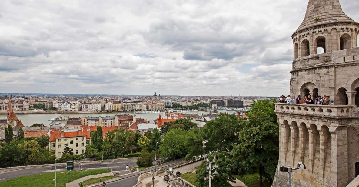 Budapest: Castle District Walk with Matthias Church Entry - Vienna Gate to Sándor Palace: fortress walls meet modern power