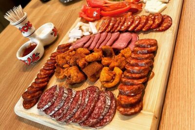 Budapest Cooking Class & Market Tour with Local Guide & Wines - What you’ll cook in Budapest: lecsó, dumplings, and paprika comfort