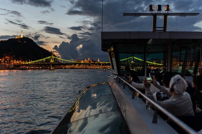 Budapest Danube River Sightseeing Night Cruise with Drink - Comfort on a Cold Night: Deck Seats, Windows, and Real Life Weather