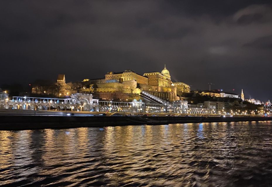 Budapest: Evening Cruise and Dinner with Welcome Drink - Budapest at night from the Danube: Buda and Pest in lighting form